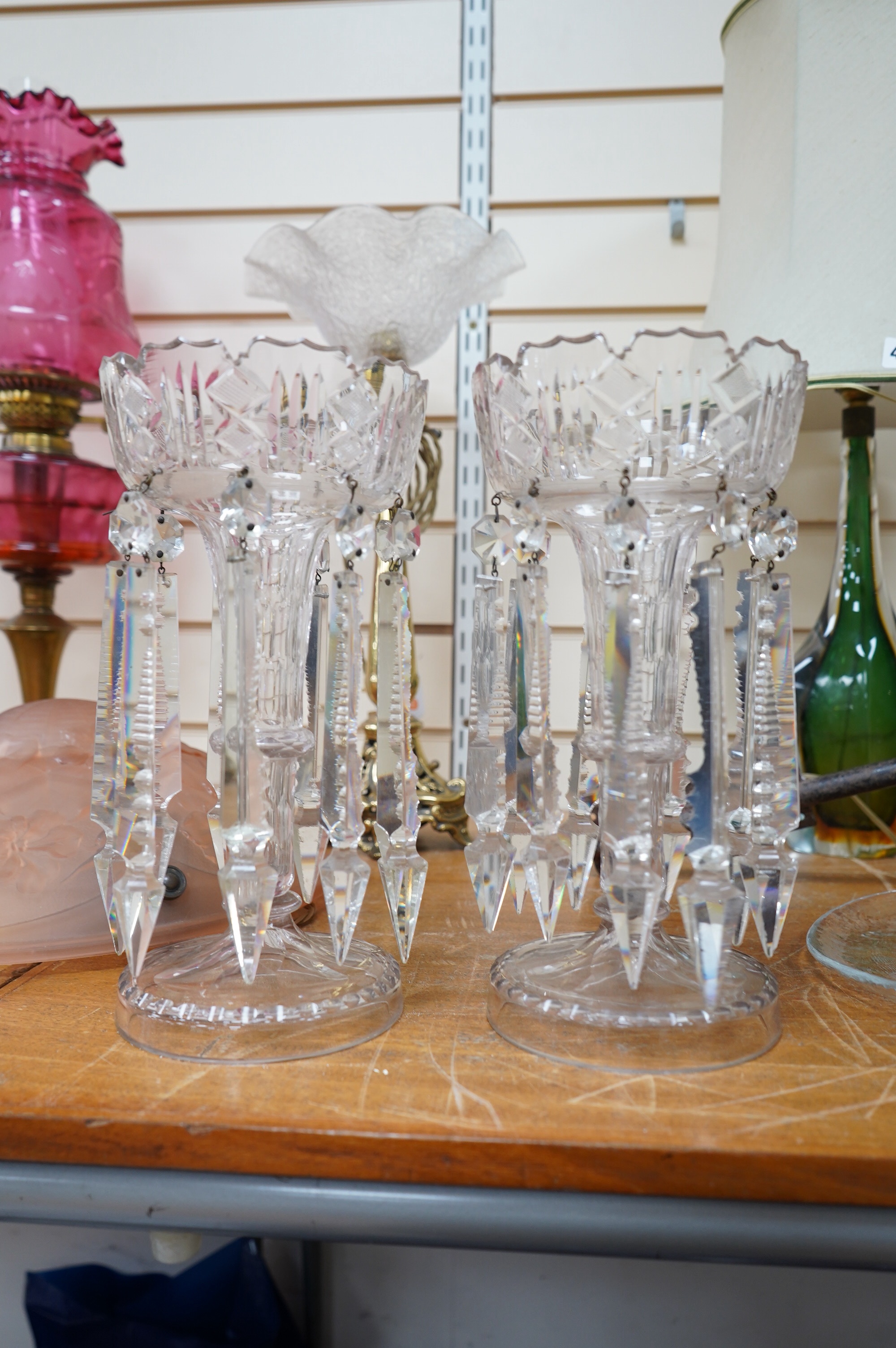 A pair of 19th century Bohemian glass lustres with crystal drops, overall 28cm high, drop 18cm. Condition - fair some chipping